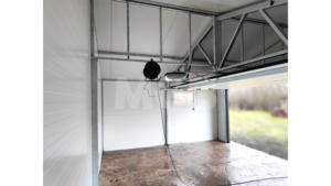 6,5×4,5m delux insulated mobile garage with gable roof, white walls, anthracite grey sectional door and door, window, 2 ventilation grilles, cornices, guttering, anthracite grey plywood roof covering
